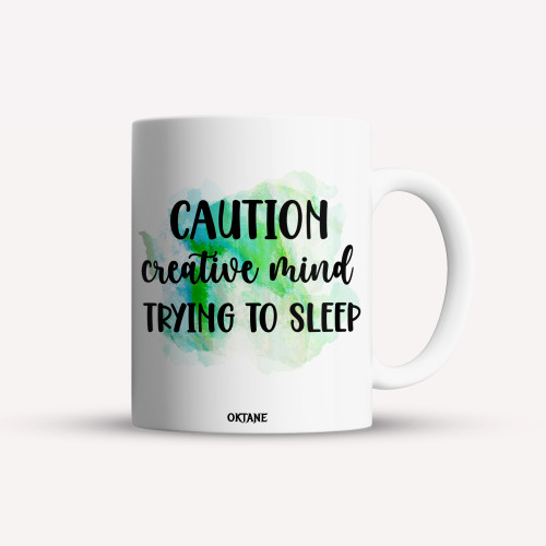 Cana personalizata, cafea/ceai, Caution, creative mind trying to sleep, Oktane, 330 ml, alba